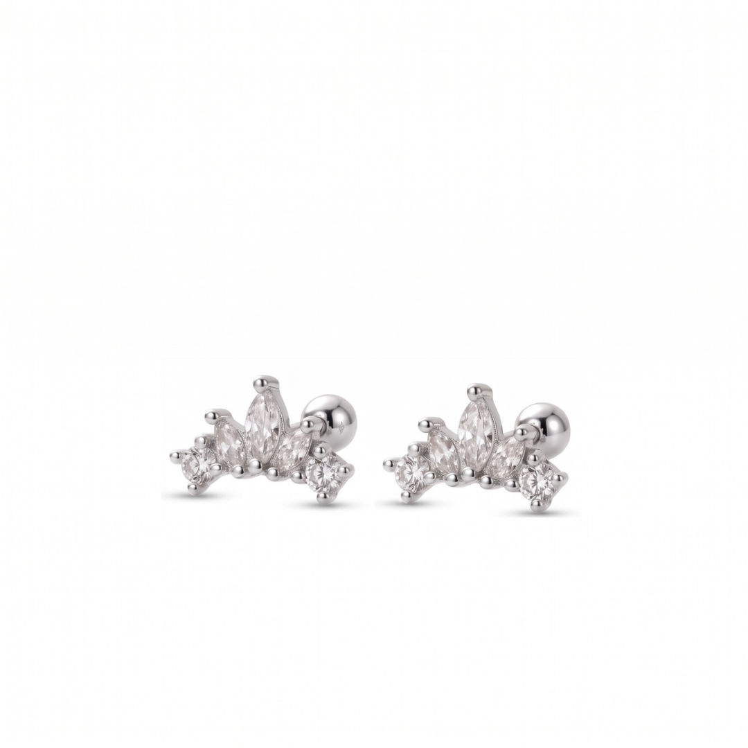 A pair of silver stud earrings featuring marquise and round-cut clear gemstones, displayed on a clean white background.