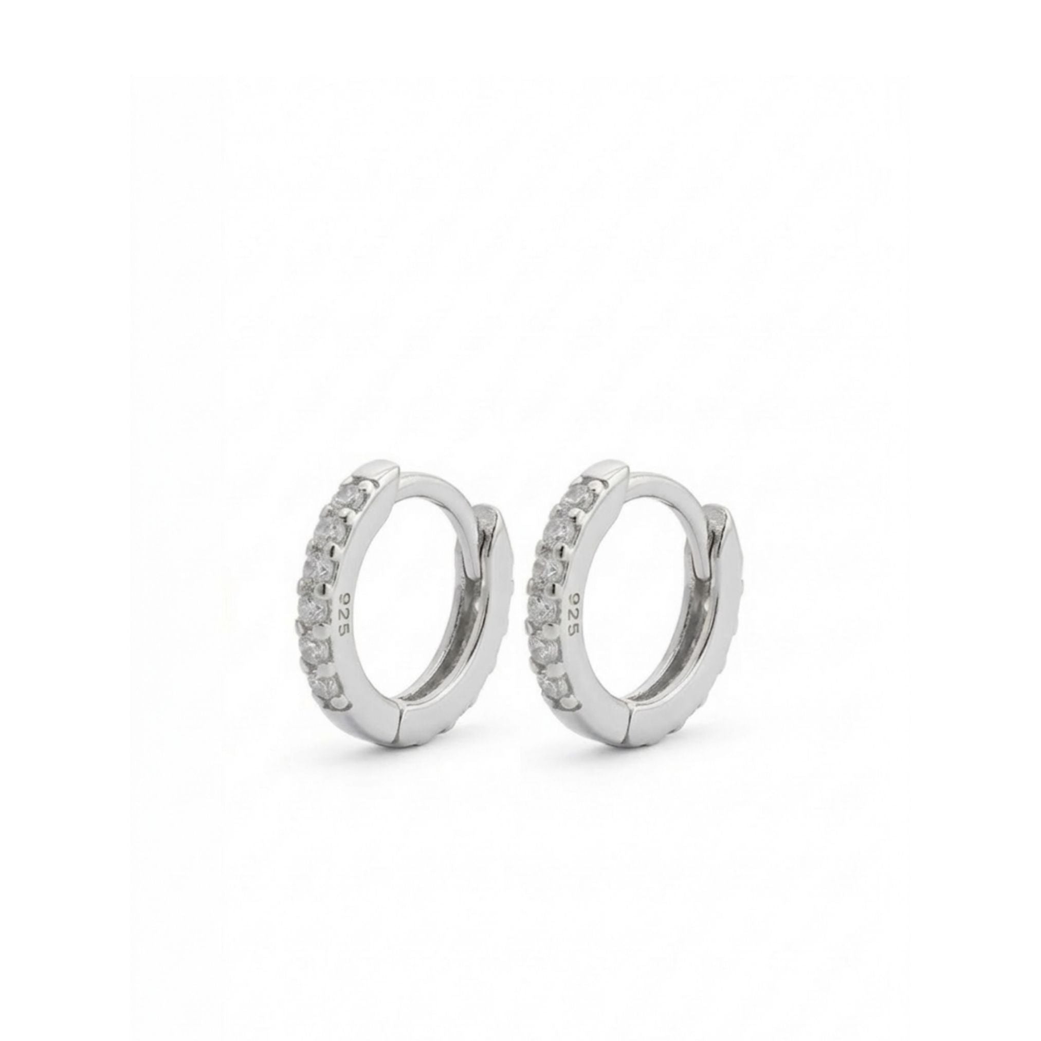 Pair of silver hoop earrings with small stones on a white background 7mm