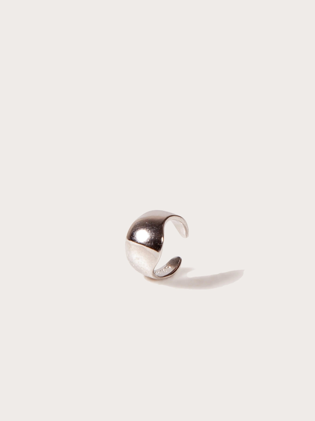Silver cuff on a white background