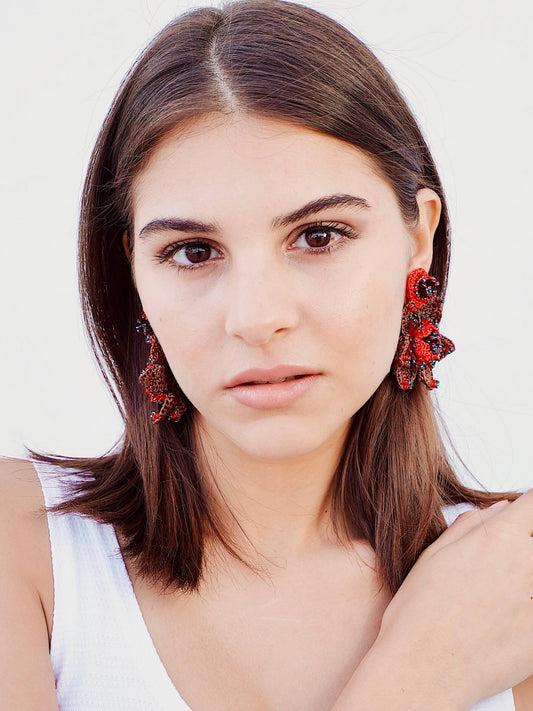 A woman wearing Audrey Bead Embroidery Statement Earrings by Seyyah