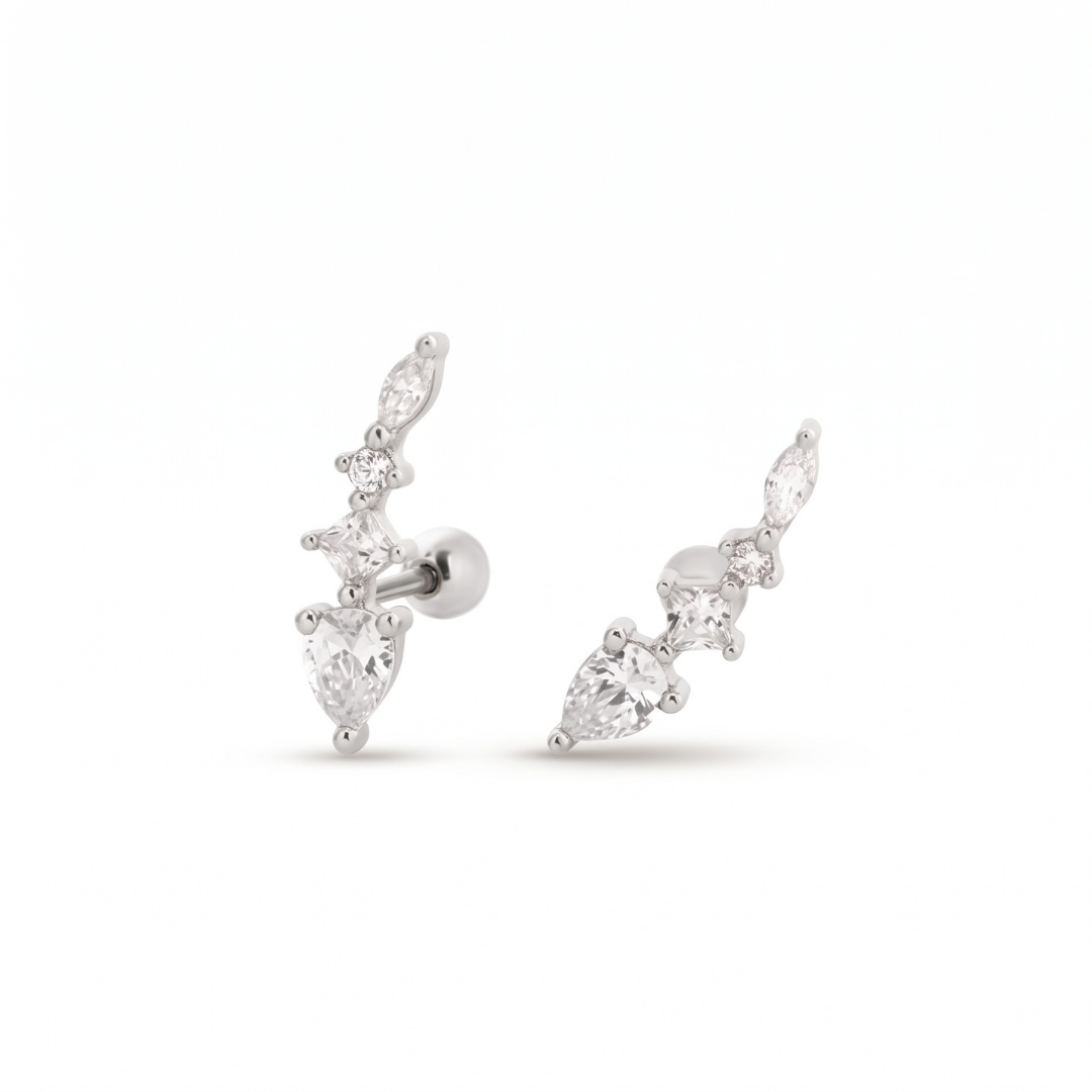 A pair of silver-toned stud earrings with marquise and round clear cz, shown on a clean white background.