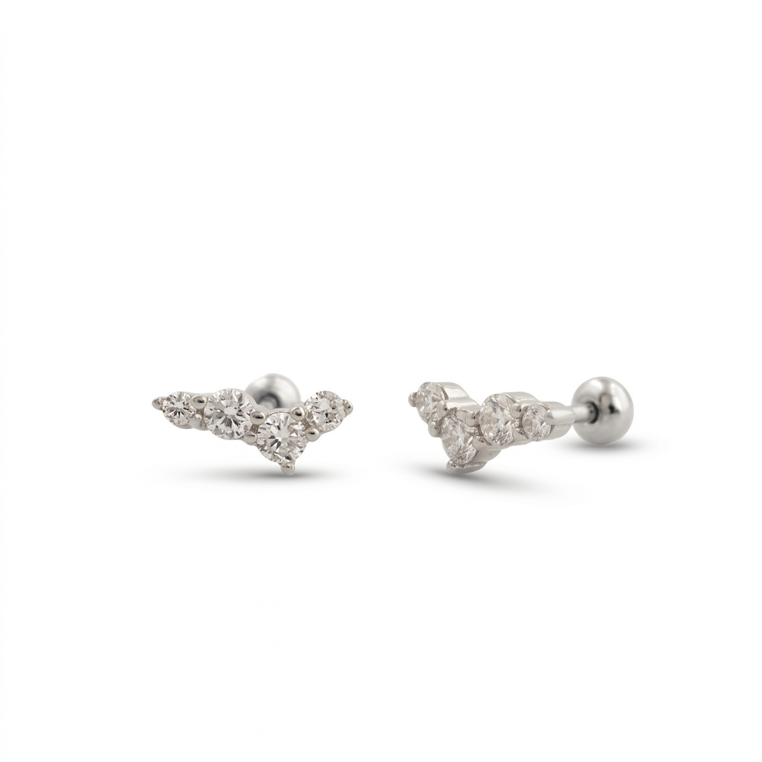 A pair of silver ear stud earrings with small clear gemstones, shown on a clean white background.