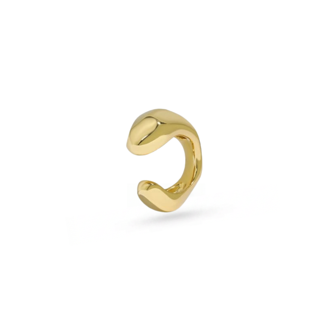 A polished gold cuff with a smooth, organic wavy curve, shown on a clean white background.