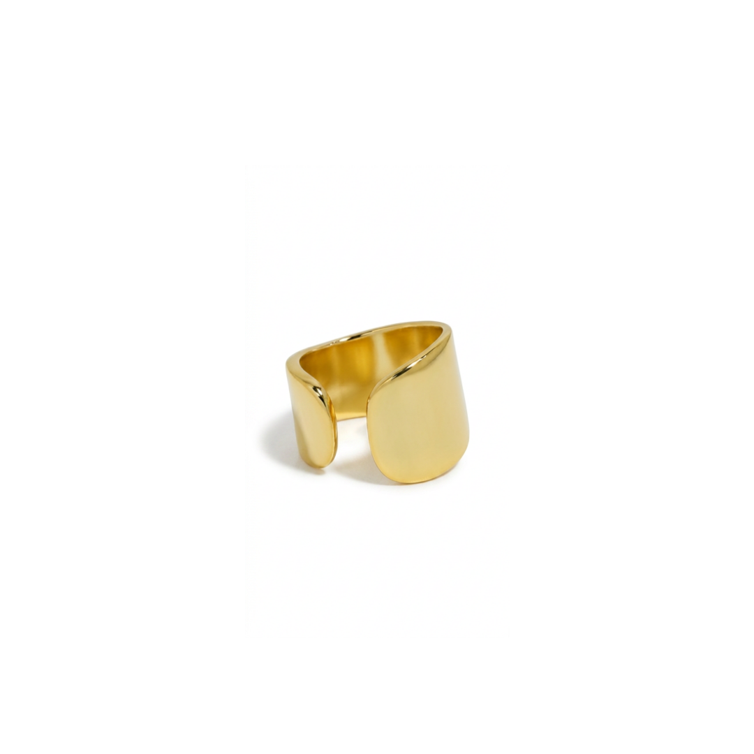 A polished gold-toned ear cuff with a wide,  organic contours, photographed on a seamless white background.