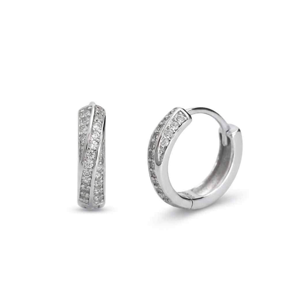 Gold hoop earrings with embedded stones on a white background