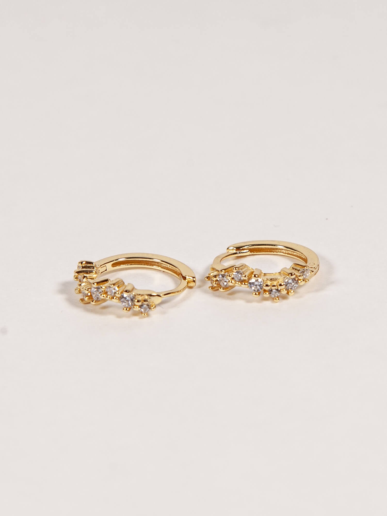 Wavy CZ 14K Gold over Silver Huggies