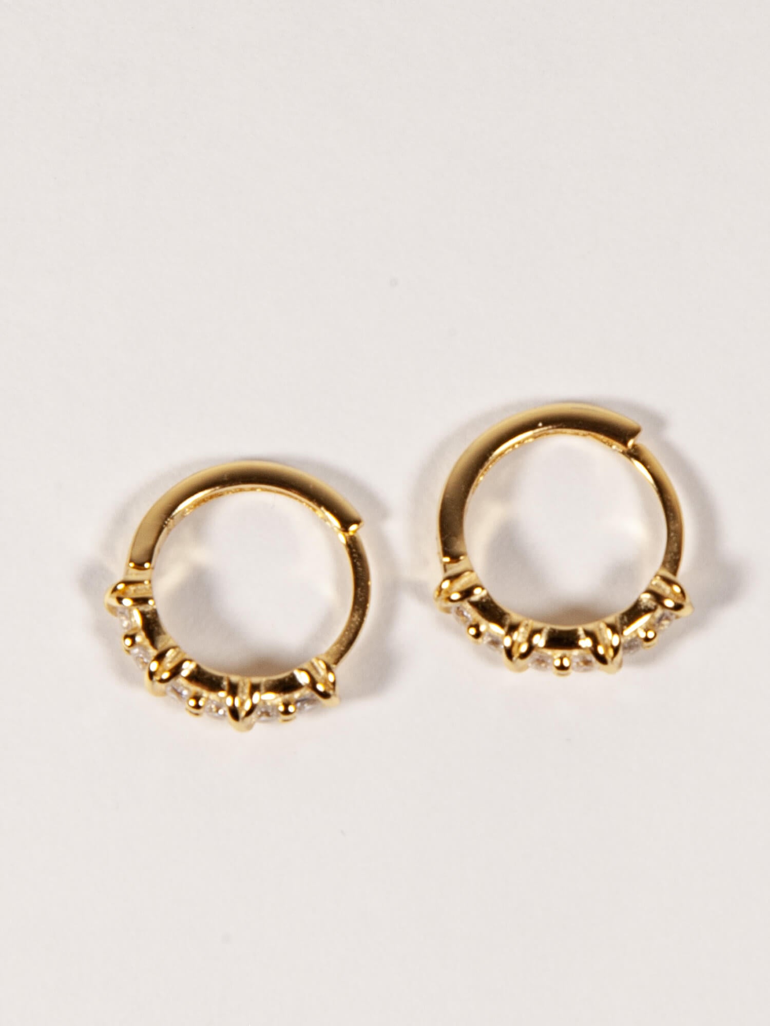 Twisted CZ Huggies in Gold