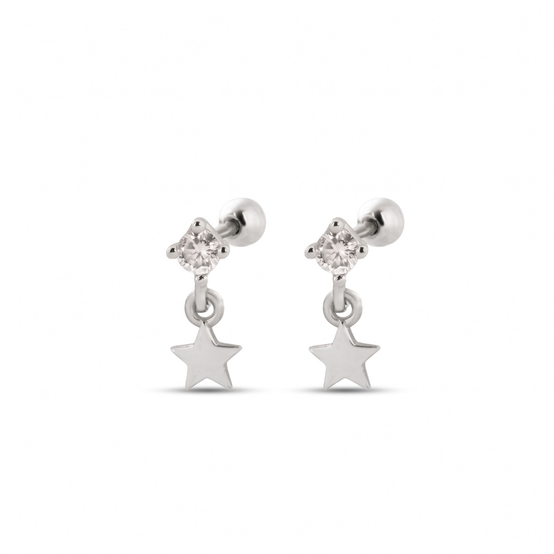 A pair of silver dangle stud earrings featuring a small clear crystal cluster at the top and a dangling five-pointed star charm below, shown on a plain white background.