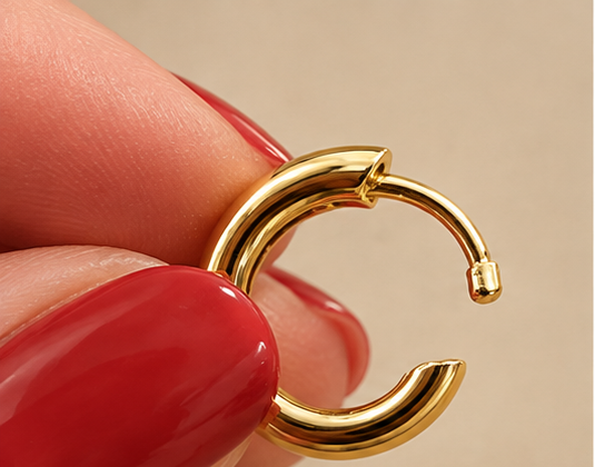CHECK THE POST

Open your huggie and examine the post carefully. Does it line up with the clasp? Look for any slight bending or misalignment before attempting to close it.